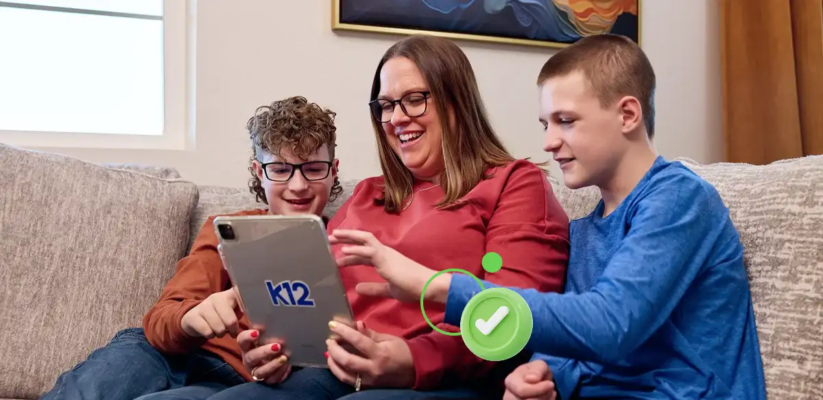 Mother and her children working with their tablet