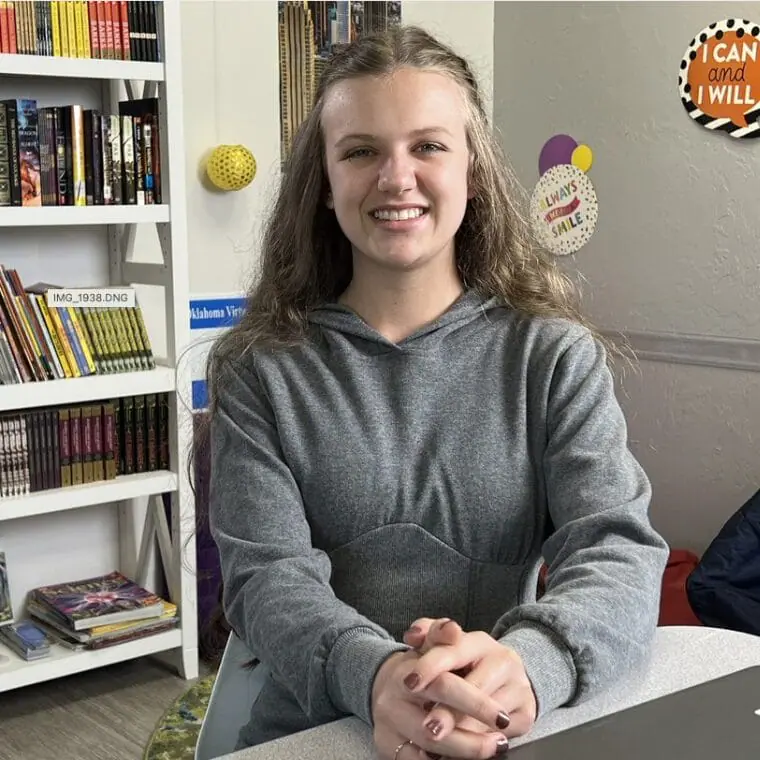 High school student smiling at the camera