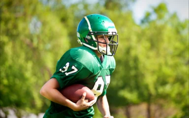 Boy playing football